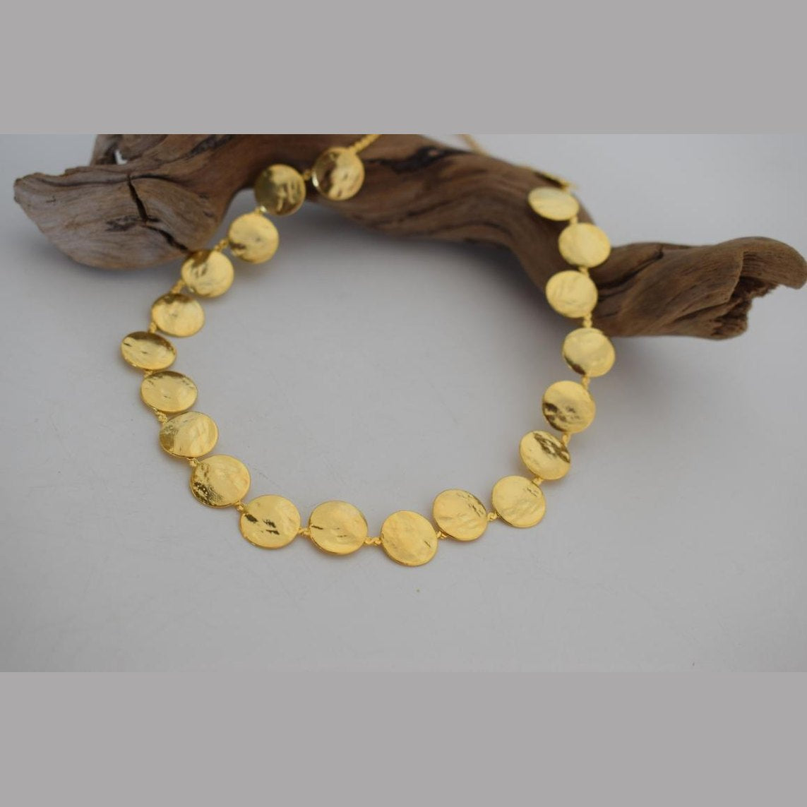 Estia2 Necklace – Handmade Greek hammered jewelry with round hammered discs, available in 18K gold and silver plated.