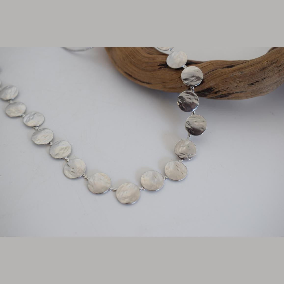 Estia2 Necklace – Handmade Greek hammered jewelry with round hammered discs, available in 18K gold and silver plated.
