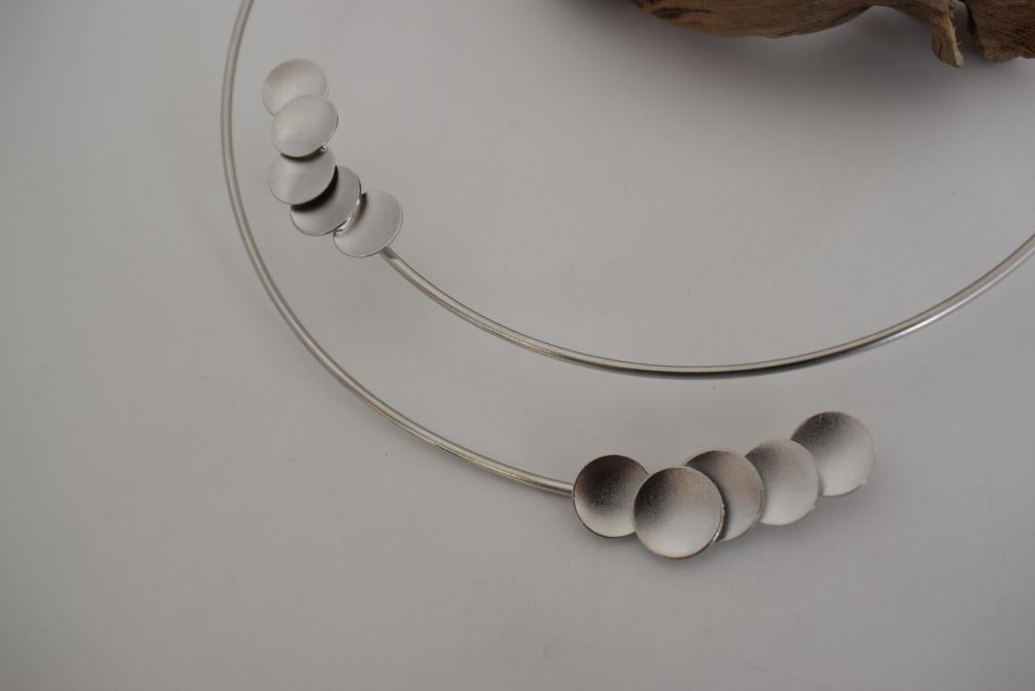 Leucothea Earrings – Handmade Greek hammered jewelry with cascading gold leaf design, available in 18K gold and silver plated.