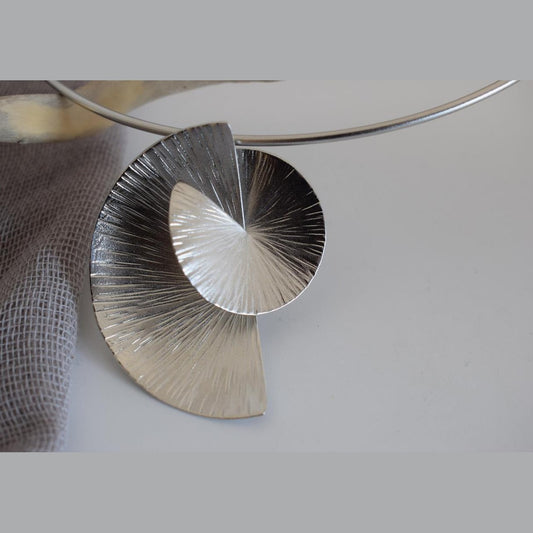 Kochlias necklace Greek hammered jewelry spiral seashell design in 18K gold, silver, and rose gold plated finish.