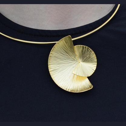 Kochlias necklace Greek hammered jewelry spiral seashell design in 18K gold, silver, and rose gold plated finish.