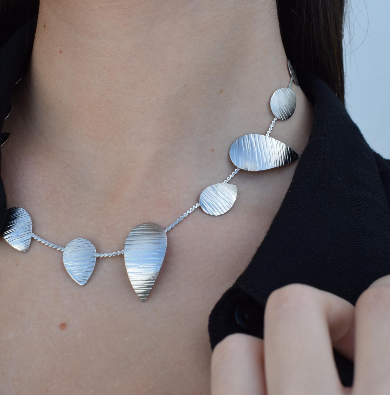 Noufaro Necklace – Handmade Greek hammered jewelry inspired by the sacred water lily, available in 18K gold or silver plated.