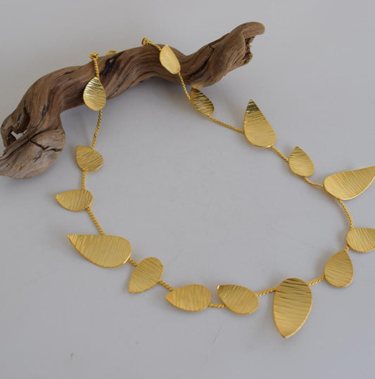 Noufaro Necklace – Handmade Greek hammered jewelry inspired by the sacred water lily, available in 18K gold or silver plated.