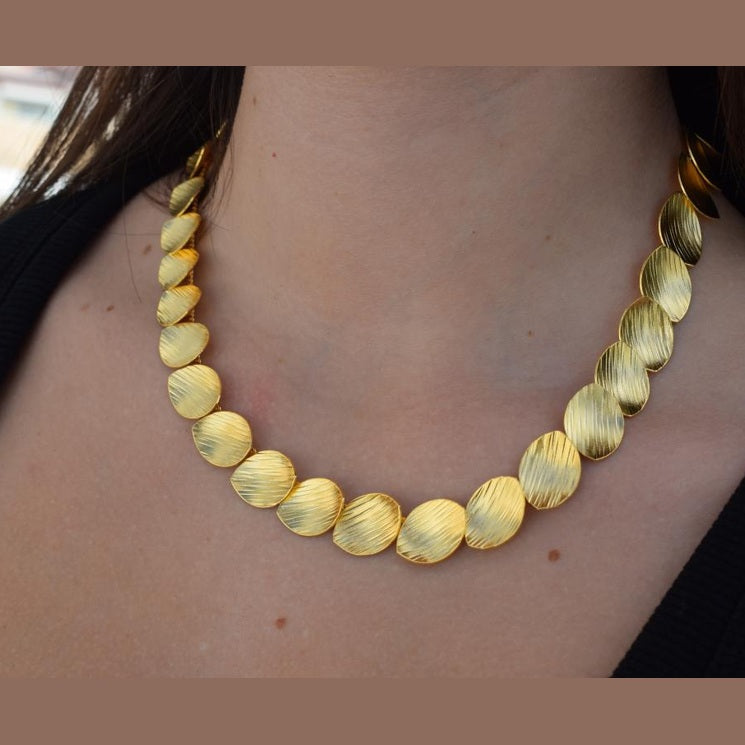 Nausicaa Necklace – Handmade Greek hammered jewelry with leaf design, available in 18K gold or silver plated finish.