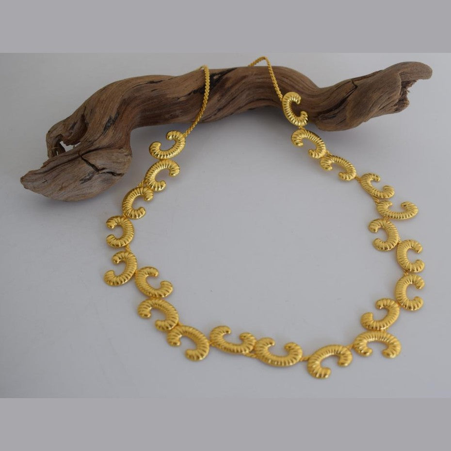 Ikaria Necklace – Handmade Greek hammered jewelry in 18K gold or silver plated with flowing design inspired by the island of Ikaria.