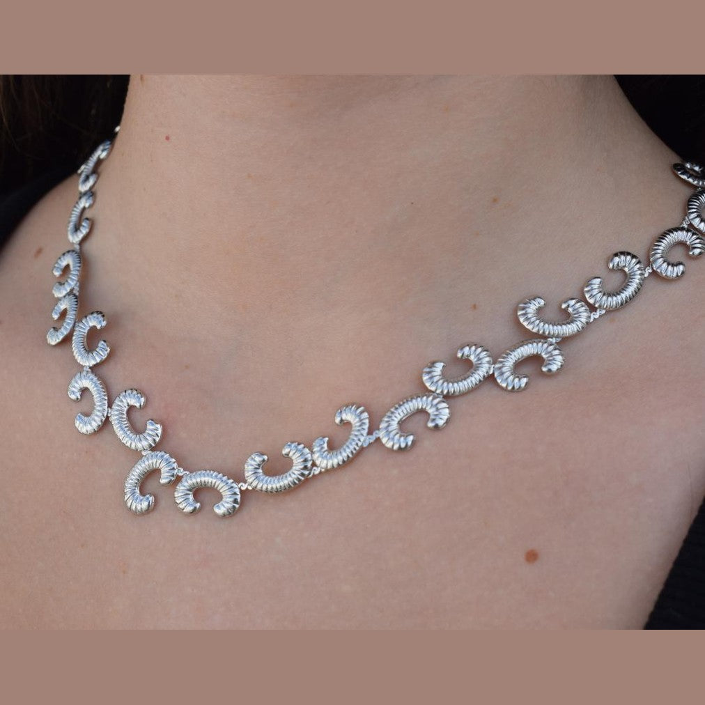 Ikaria Necklace – Handmade Greek hammered jewelry in 18K gold or silver plated with flowing design inspired by the island of Ikaria.