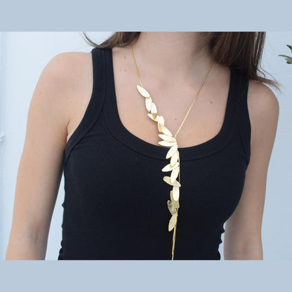 Nike Necklace – Handmade Greek hammered jewelry with golden leaf design, inspired by the goddess of victory, available in 18K gold or silver plated.