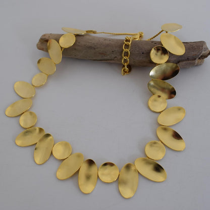 Heliades Necklace – handmade Greek hammered jewelry inspired by the daughters of Helios, available in 18K gold and silver plated.