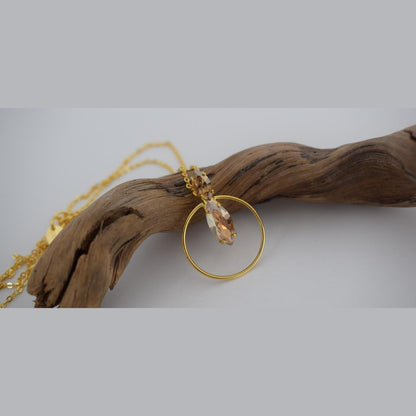 Helike Necklace – handmade Greek hammered jewelry with crystal and circular pendant, available in 18K gold, silver, and rose gold plated.