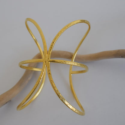 Handmade Cosmos bracelet, Greek hammered jewelry in 18K gold or silver plated with radiating sculptural openwork design.