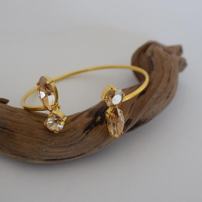 Santorini Bracelet – handmade Greek hammered jewelry with crystals, available in 18K gold and silver plated.