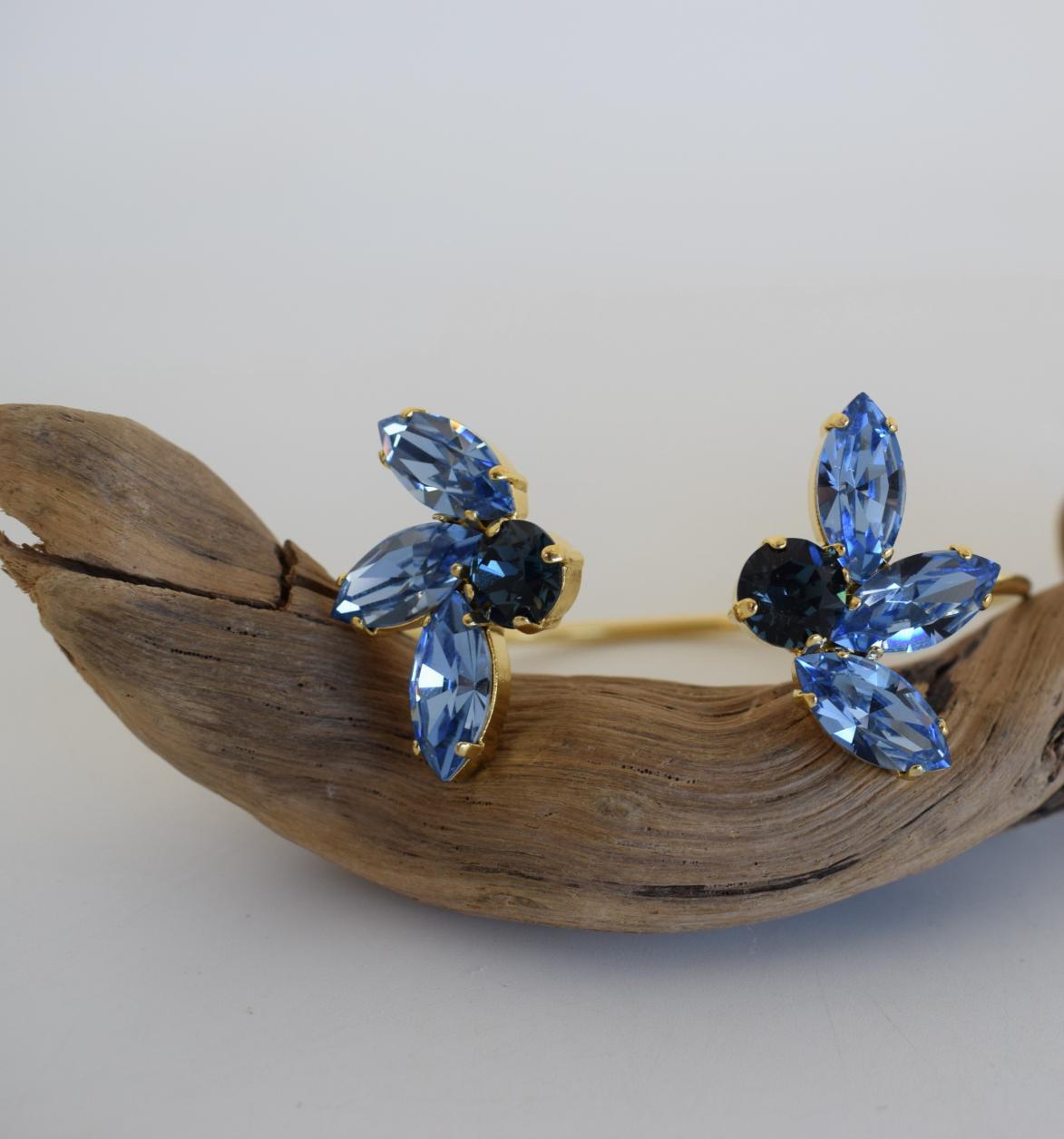 Amaryllis Bracelet – handmade Greek hammered jewelry with blue Swarovski crystals, available in 18K gold or silver plated.