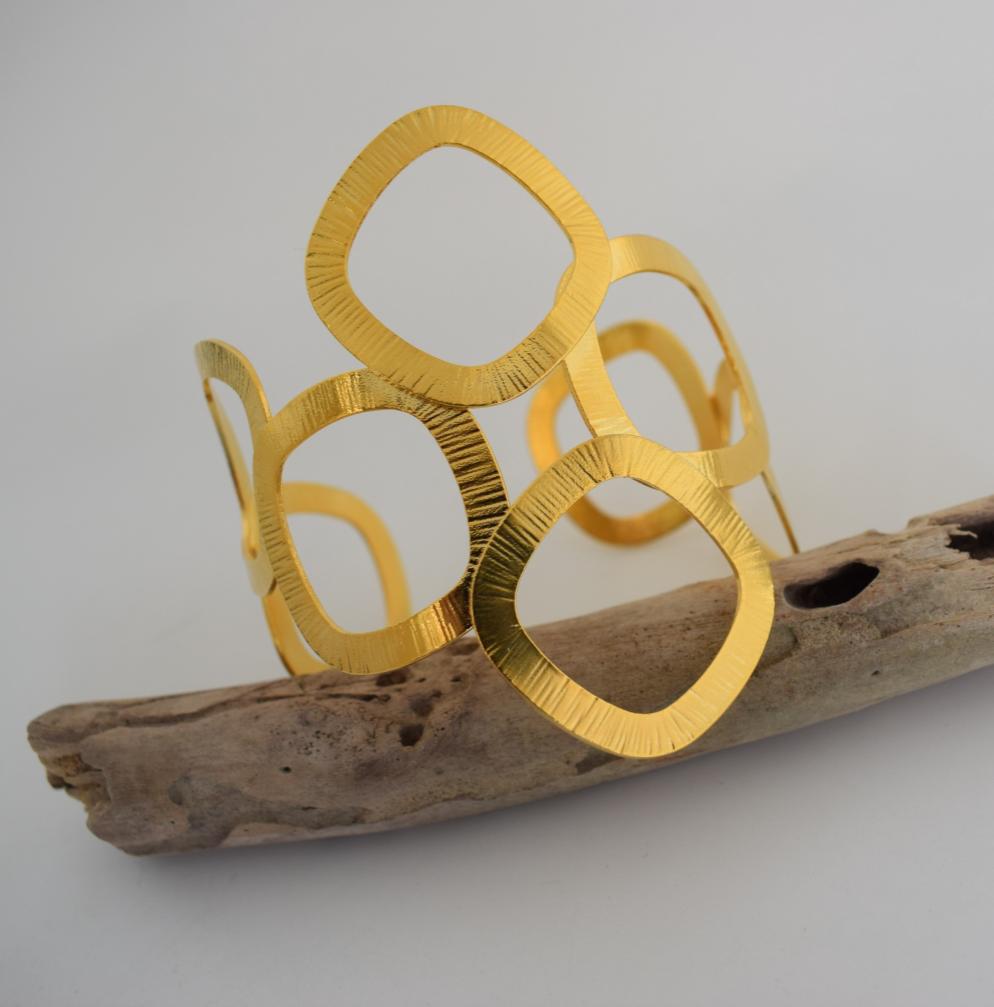 Kyklades Bracelet – handmade Greek hammered jewelry with openwork geometric design, available in 18K gold and silver plated.