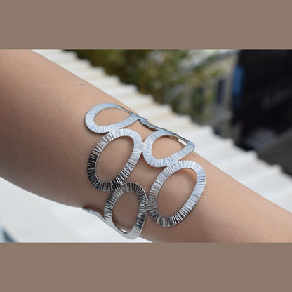 Handmade Rhodes bracelet, Greek hammered jewelry in 18K gold or silver plated with sculptural interlocking openwork design.