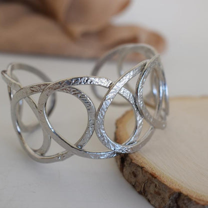 Handmade Hydor bracelet, Greek hammered jewelry in 18K gold or silver plated with flowing openwork sculptural design.