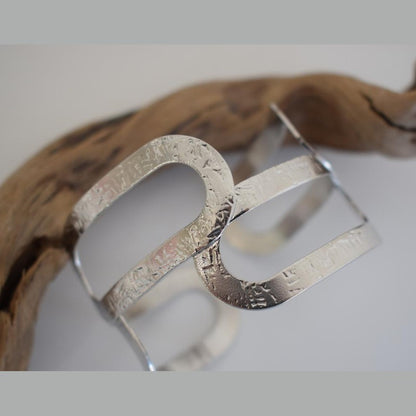 Handmade Galatea bracelet, Greek hammered jewelry available in 18K gold or silver plated with sculptural openwork design.