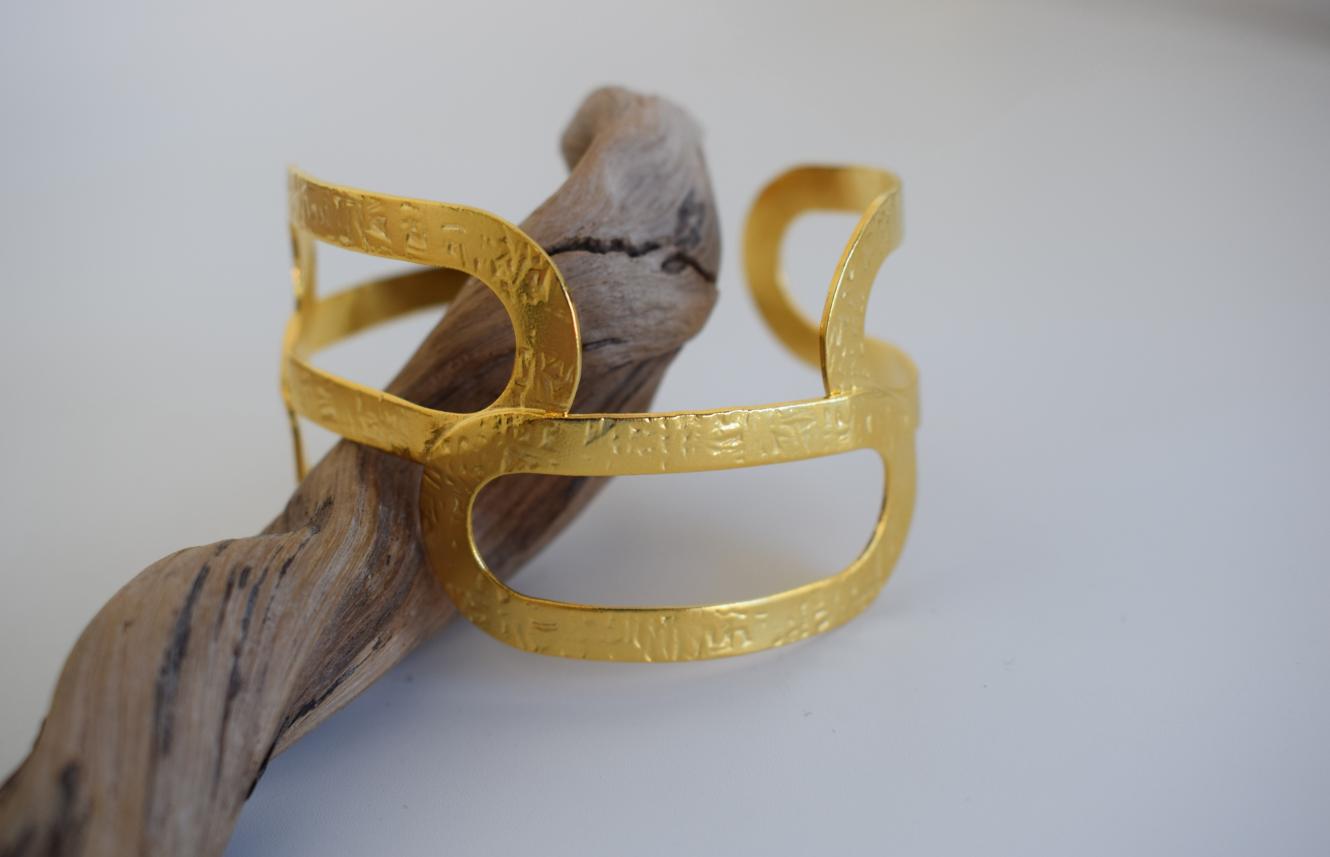 Handmade Galatea bracelet, Greek hammered jewelry available in 18K gold or silver plated with sculptural openwork design.