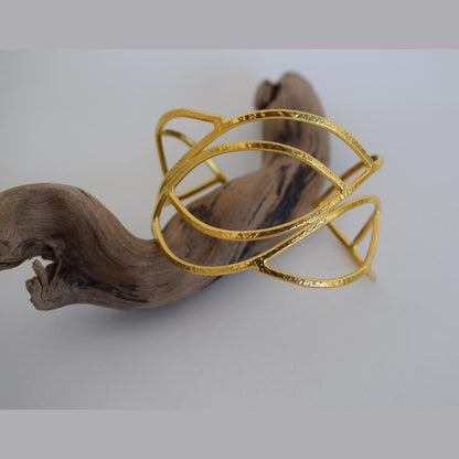 Handmade Narkissos bracelet, Greek hammered jewelry in 18K gold or silver plated with interwoven sculptural openwork design.