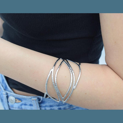 Handmade Narkissos bracelet, Greek hammered jewelry in 18K gold or silver plated with interwoven sculptural openwork design.