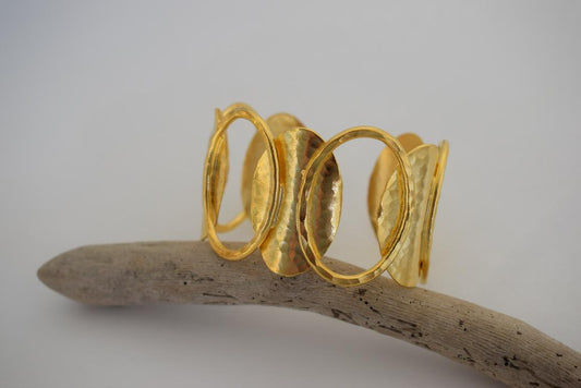 Handmade Andromeda bracelet, Greek hammered jewelry in 18K gold or silver plated with interlocking sculptural oval elements.