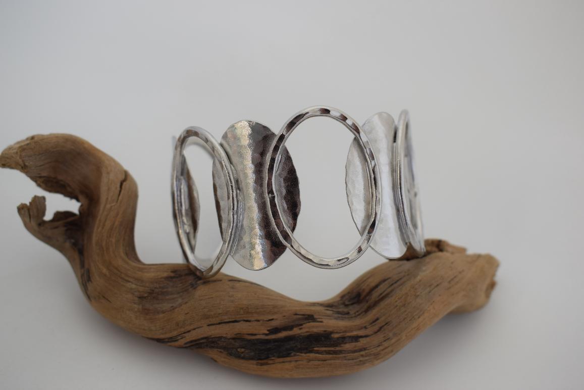 Handmade Andromeda bracelet, Greek hammered jewelry in 18K gold or silver plated with interlocking sculptural oval elements.