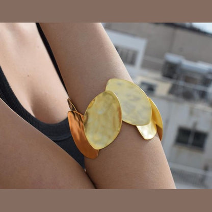 Handmade Nymphe bracelet, Greek hammered jewelry in 18K gold or silver plated with layered sculptural oval forms.