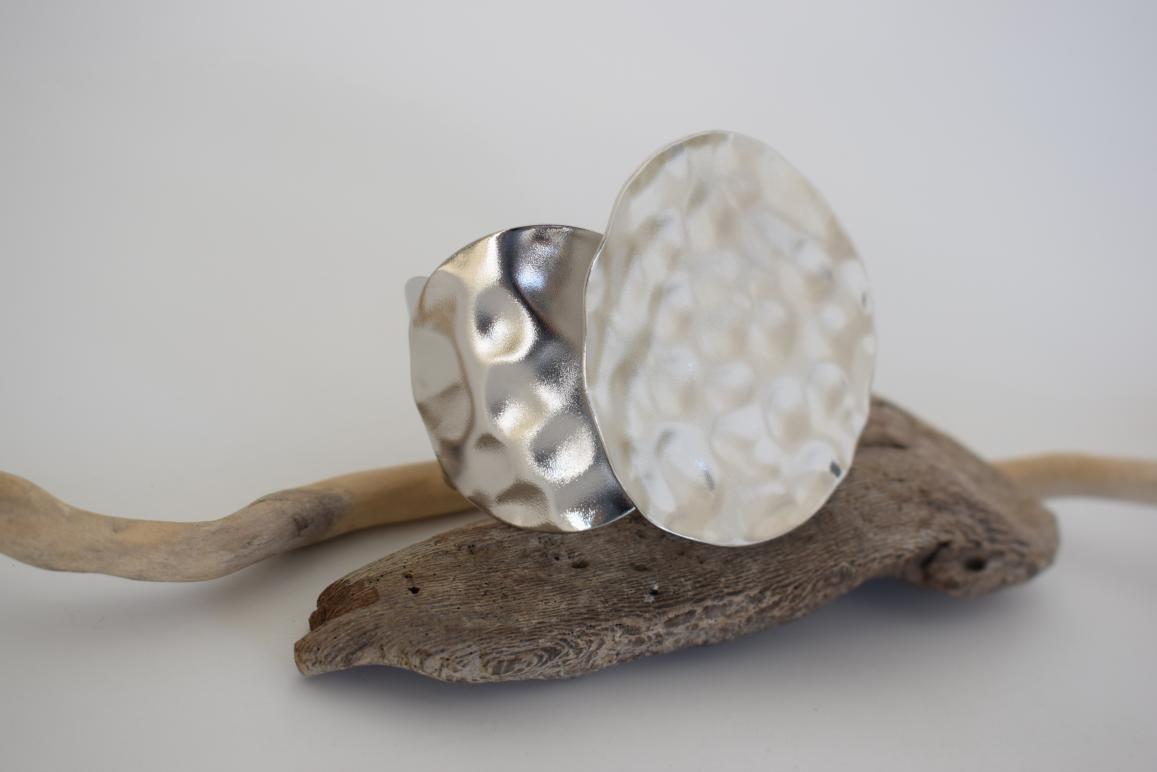 Echo bracelet, handmade Greek hammered jewelry with sculptural circular design, available in 18K gold or silver plated.