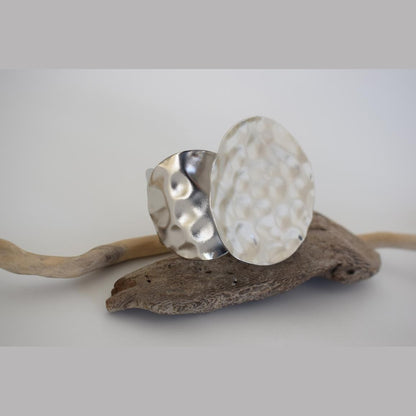 Echo bracelet, handmade Greek hammered jewelry with sculptural circular design, available in 18K gold or silver plated.