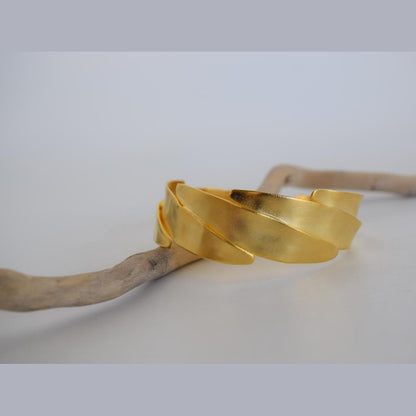 Elaia 2 bracelet, handmade Greek hammered jewelry, sculptural wrapped design, available in 18K gold or silver plated.