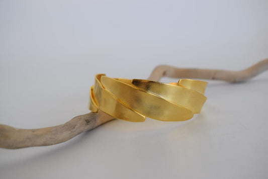 Elaia 2 bracelet, handmade Greek hammered jewelry, sculptural wrapped design, available in 18K gold or silver plated.