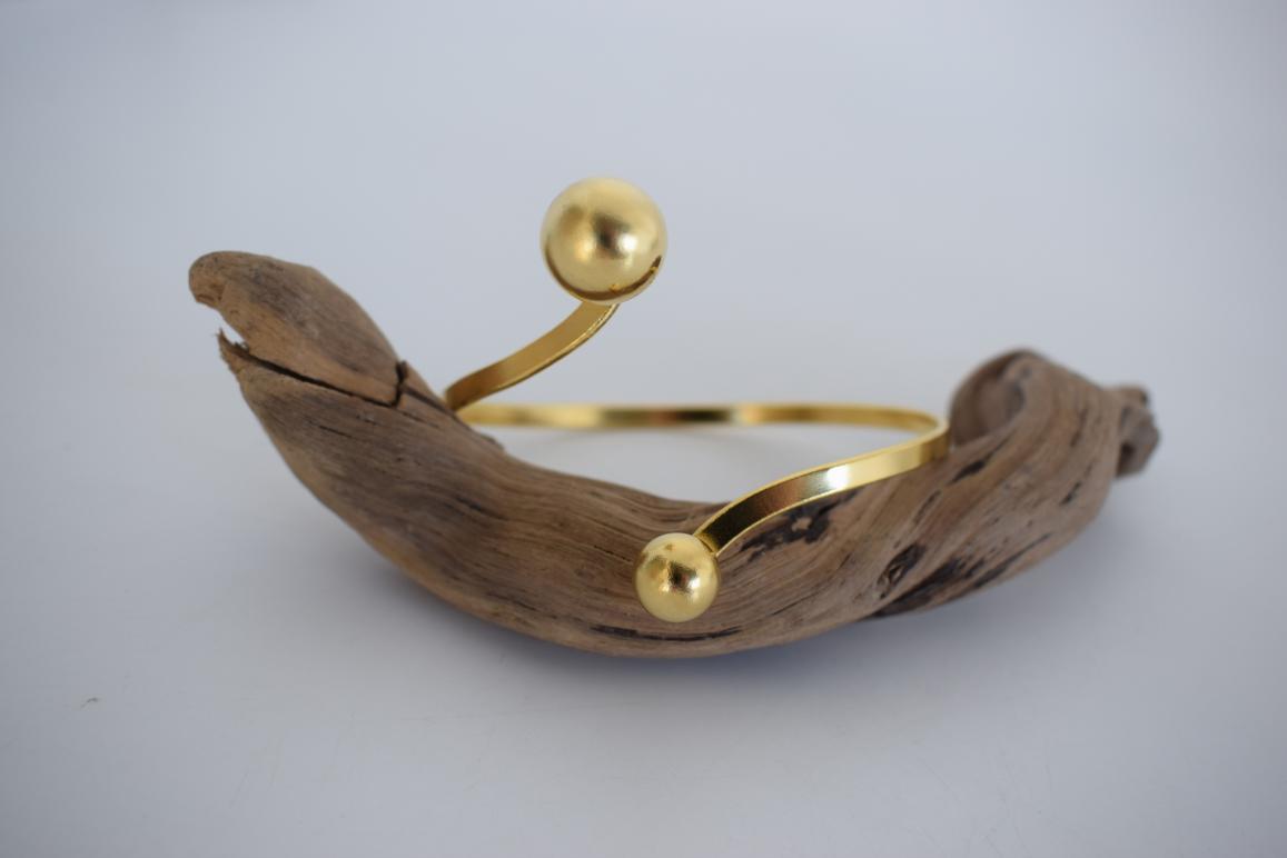 Handmade Sphaira bracelet, Greek hammered jewelry in 18K gold or silver plated with two sculptural spherical elements.