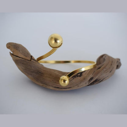 Handmade Sphaira bracelet, Greek hammered jewelry in 18K gold or silver plated with two sculptural spherical elements.