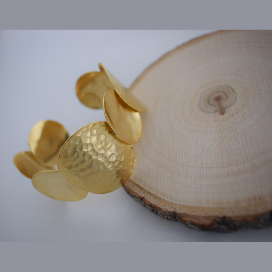 Diskos bracelet, handmade Greek hammered jewelry available in 18K gold and silver plated.