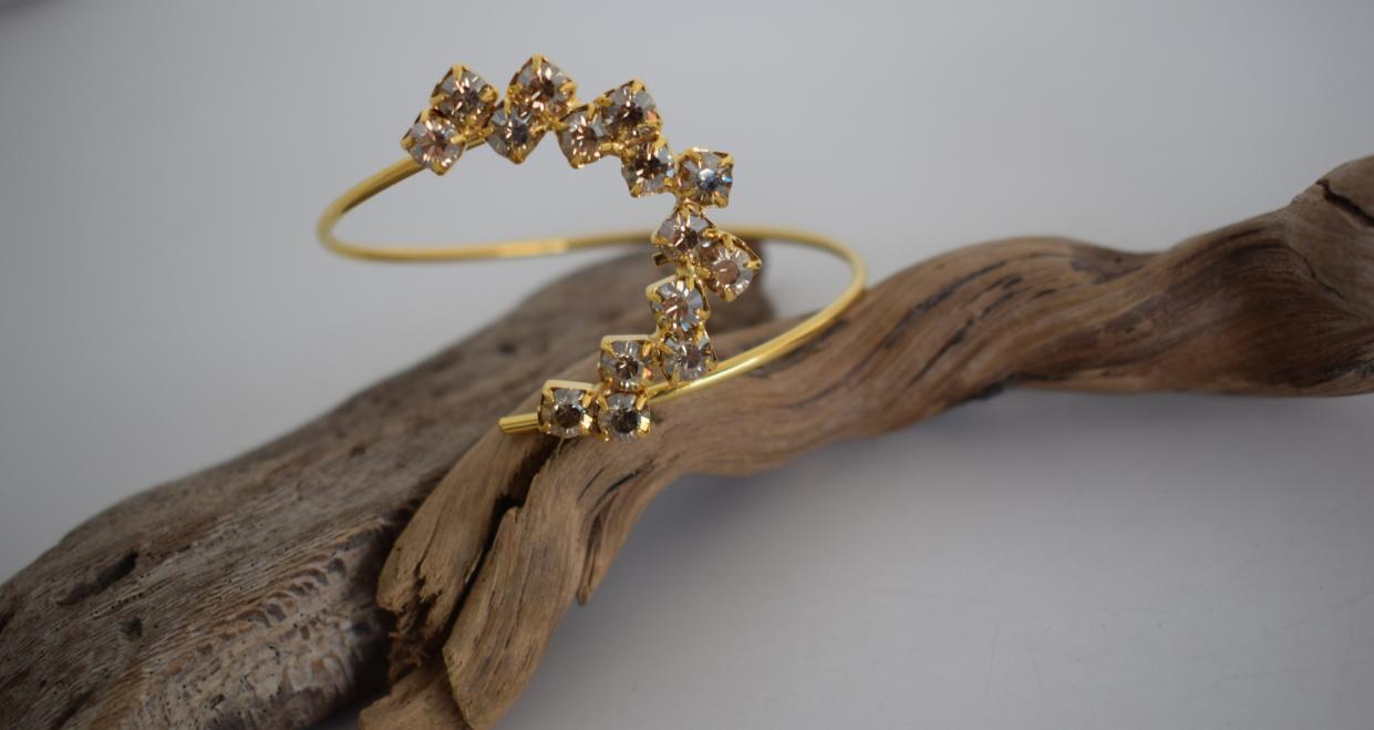 Asteria bracelet, handmade Greek hammered jewelry with Swarovski crystal constellation design, available in 18K gold or silver plated.