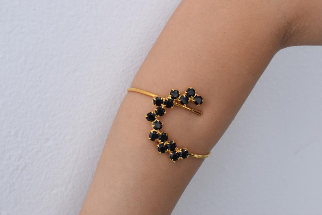 Asteria bracelet, handmade Greek hammered jewelry with Swarovski crystal constellation design, available in 18K gold or silver plated.