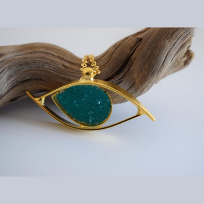 Eye necklace with hammered eye design and stones. Greek hammered jewelry in 18K gold, silver 