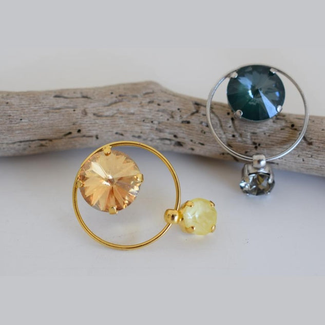 Evanthos Earrings, handmade Greek hammered jewelry with Swarovski crystals available in gold and silver plated.