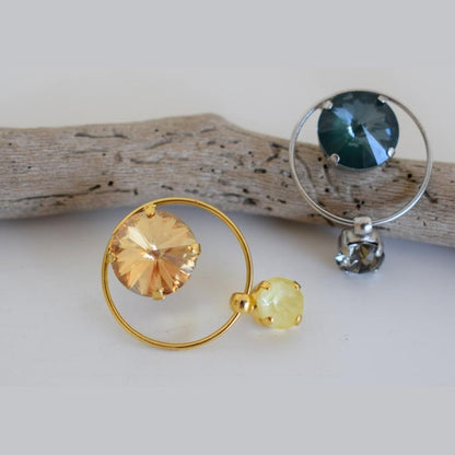 Evanthos Earrings, handmade Greek hammered jewelry with crystals available in gold and silver plated.