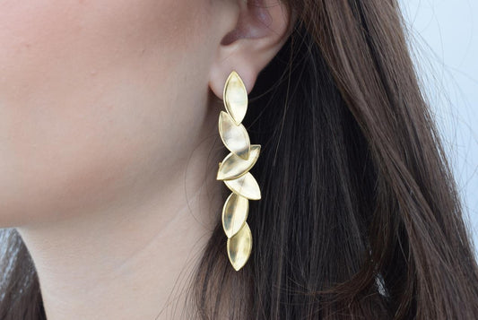 Elaia 4 cascading olive-leaf earrings, handmade Greek hammered jewelry, available in gold or silver plated.