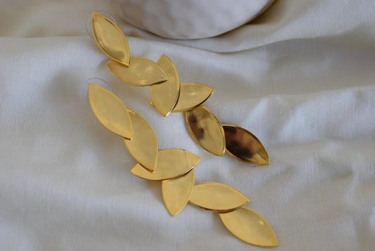 Elaia 4 cascading olive-leaf earrings, handmade Greek hammered jewelry, available in gold or silver plated.