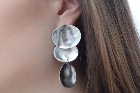 Heliades earrings in handmade Greek hammered jewelry design, available in 18K gold plated and 18K silver plated.