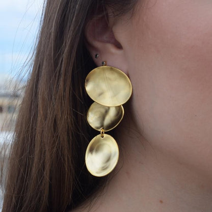 Heliades earrings in handmade Greek hammered jewelry design, available in 18K gold plated and 18K silver plated.