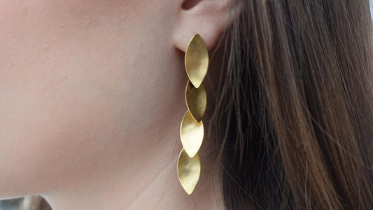 Elaia earrings in handmade Greek hammered jewelry design, available in 18K gold plated and 18K silver plated.