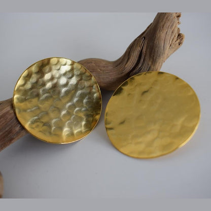 Rhea Earrings handmade Greek hammered jewelry with round disc design, available in 18K gold plated and silver plated finishes.