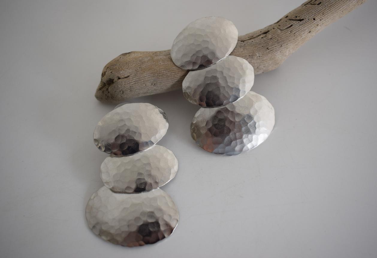 Dimitra earrings in handmade Greek hammered jewelry design, available in 18K gold plated and 18K silver plated.