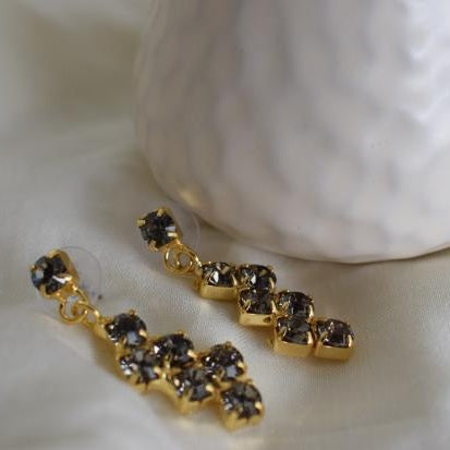 Asteria Earrings handmade Greek hammered jewelry with Fine crystals in a linear drop design, available in 18K gold plated and silver plated.