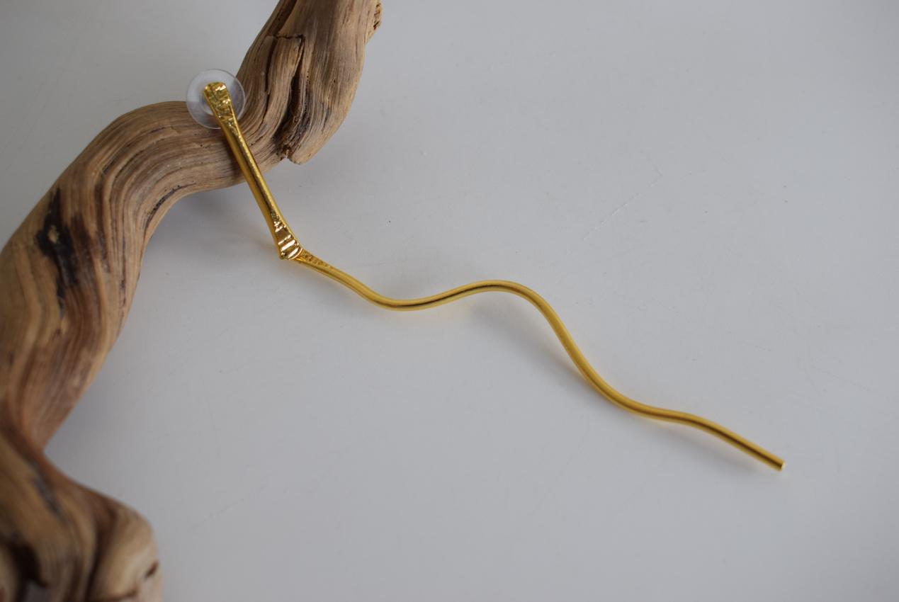 Delphi3 earrings in handmade Greek hammered jewelry, shown in a long organic design and available in 18K gold plated and silver plated finishes.