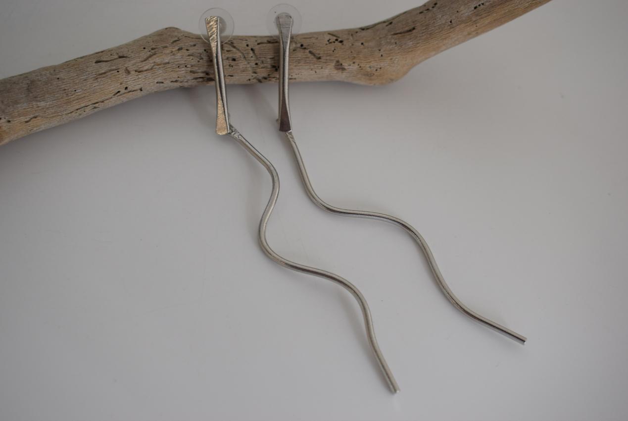 Delphi3 earrings in handmade Greek hammered jewelry, shown in a long organic design and available in 18K gold plated and silver plated finishes.