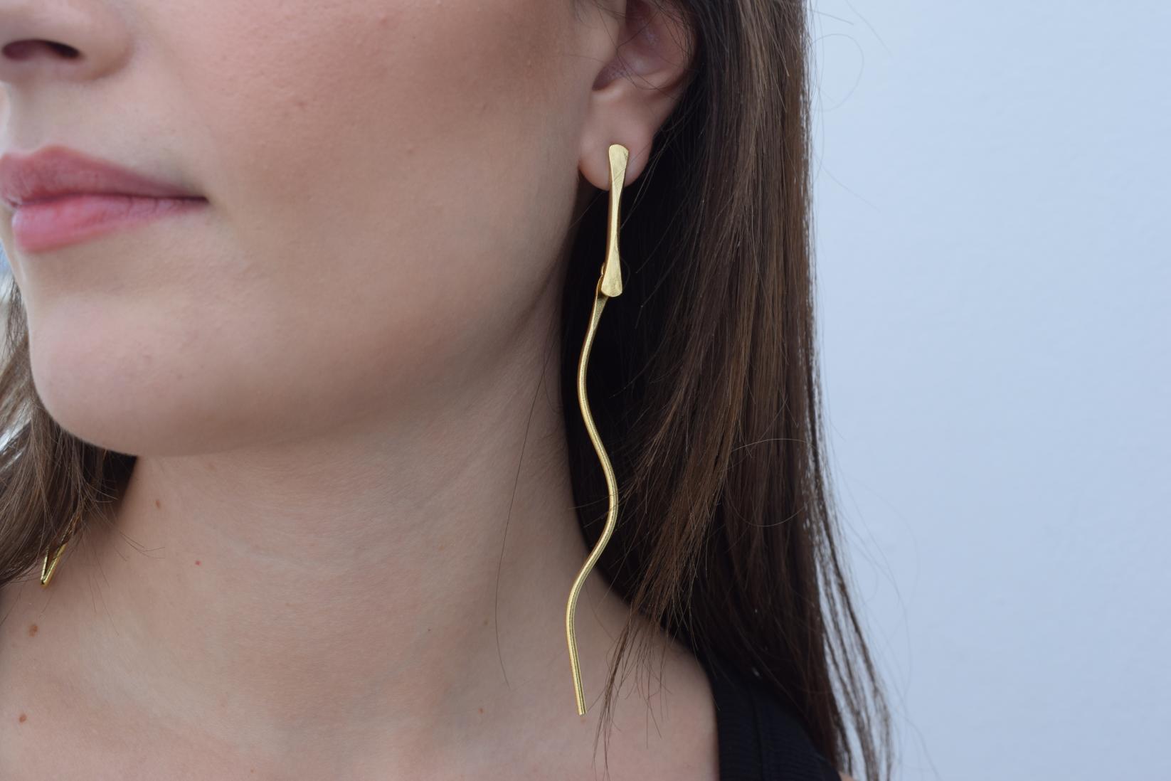 Delphi3 earrings in handmade Greek hammered jewelry, shown in a long organic design and available in 18K gold plated and silver plated finishes.