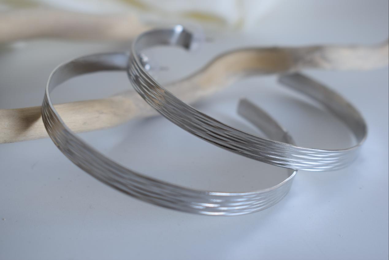 Eos2 earrings in handmade Greek hammered jewelry, featuring open hoop design and available in 18K gold plated and silver plated finishes.